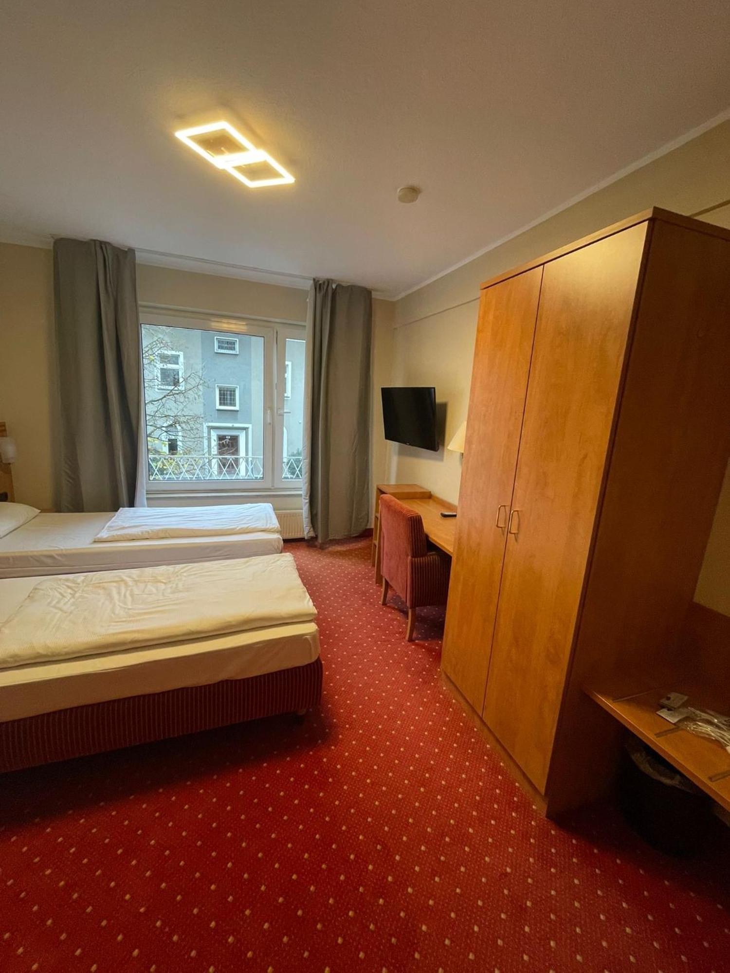 Sun Hotel Essen Bagian luar foto